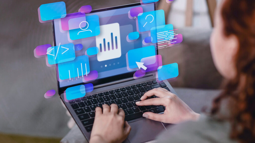 A person using a laptop with illustrated digital icons, including graphs, user avatars, and code, floating above the screen, symbolizing data analysis and technology.